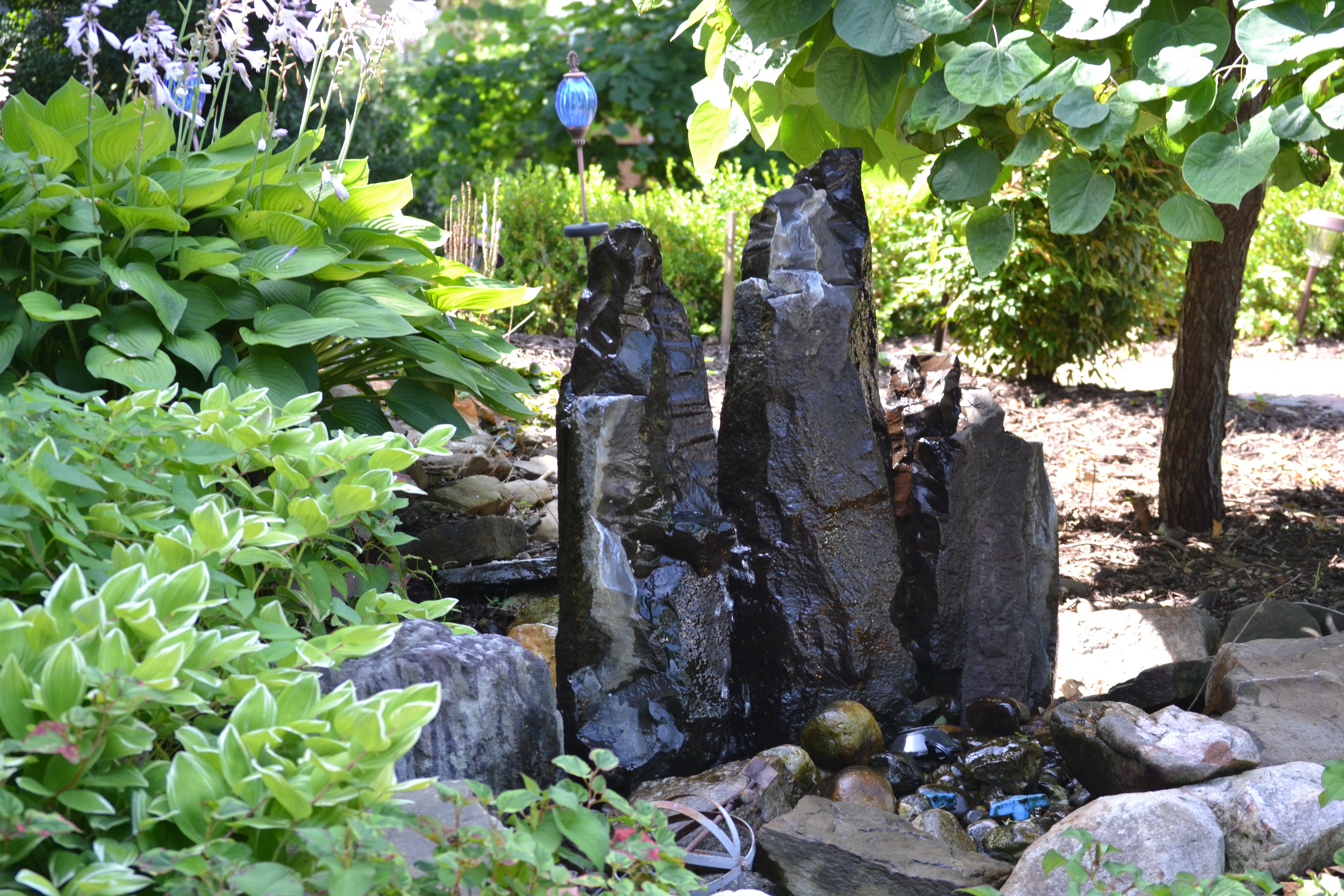 fountain and boulders