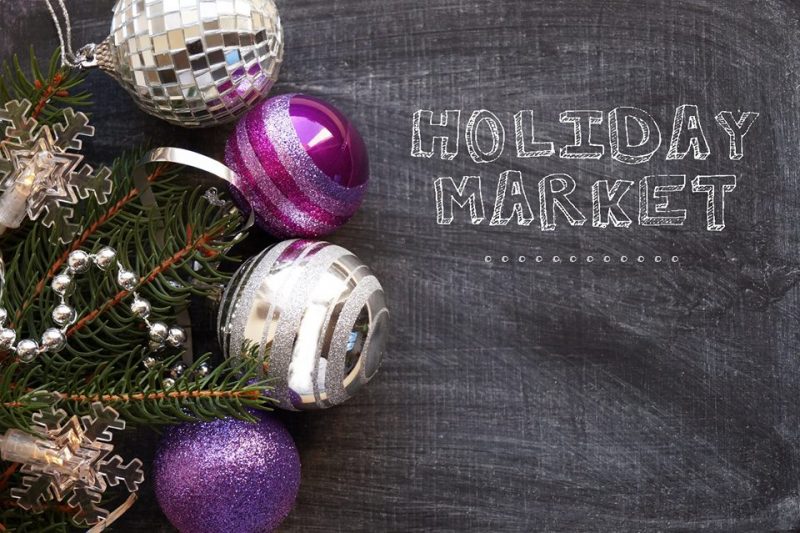 purple and white christmas ball ornaments on the right on the left "Holiday Market"