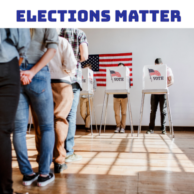 Elections Matters a line of voters wait to vote behind the privacy screens with the American flag printed on them