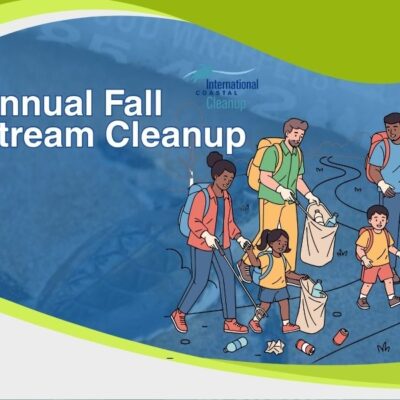 Family members walking along a trail while collecting litter into bags and bins, with scattered trash on the ground International Coastal Cleanup logo with a blue bird silhouette and wave-like lines above the text “International Coastal Cleanup” in blue. Ocean Conservancy logo with a blue circular wave emblem and the text “Ocean Conservancy” in dark blue, with small blue splashes around the emblem.