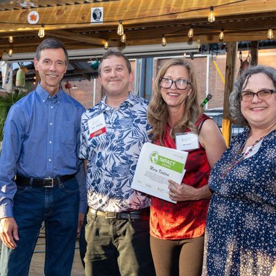 John Bloom, an executive committee member of the Potomac River Group of the Sierra Club, Levi Novey, EcoAction Arlington Board Chair, Mary Kadera, 2026 Impact Award recipient, and Elenor Hodges, EcoAction Arlington Executive Director